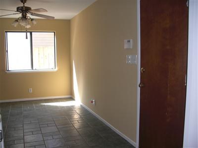 Eating area, Tile floor, fresh paint, security system, garage pedestrian door, window in eating area, ceiling fan.