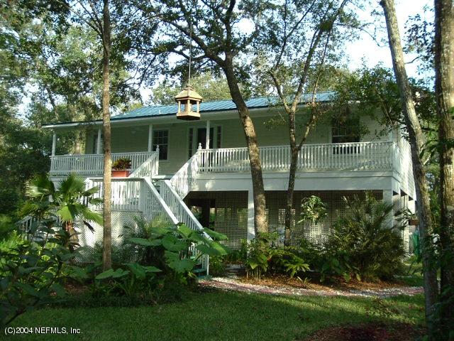 a house view with a garden space