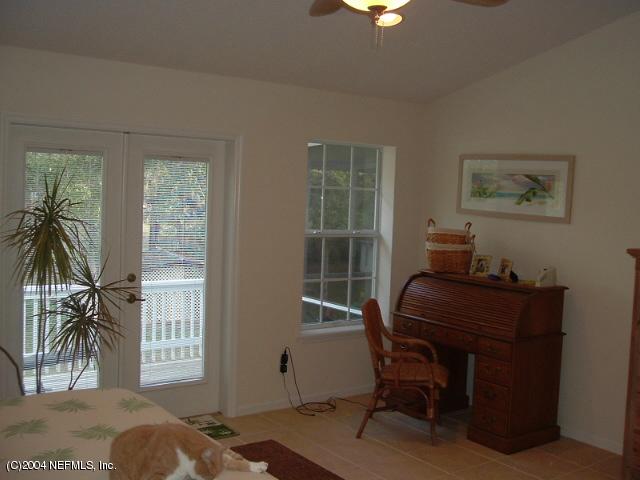 8435 Florence Cove Road St. Augustine, FL 32092 - Photo 14 of 20 a workspace with furniture and a window