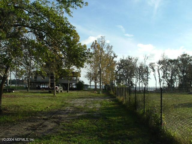 8435 Florence Cove Road St. Augustine, FL 32092 - Photo 19 of 20 a garden view with a lake view