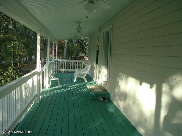 8435 Florence Cove Road St. Augustine, FL 32092 - Photo 3 of 20 a view of a porch