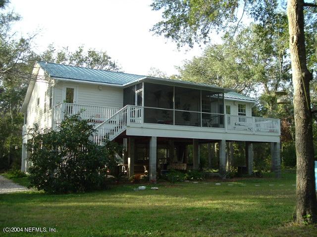 8435 Florence Cove Road St. Augustine, FL 32092 - Photo 4 of 20 a view of house with a yard