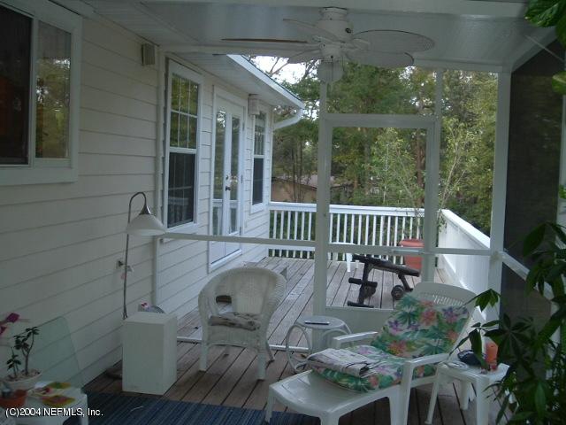 8435 Florence Cove Road St. Augustine, FL 32092 - Photo 5 of 20 a view of balcony with furniture