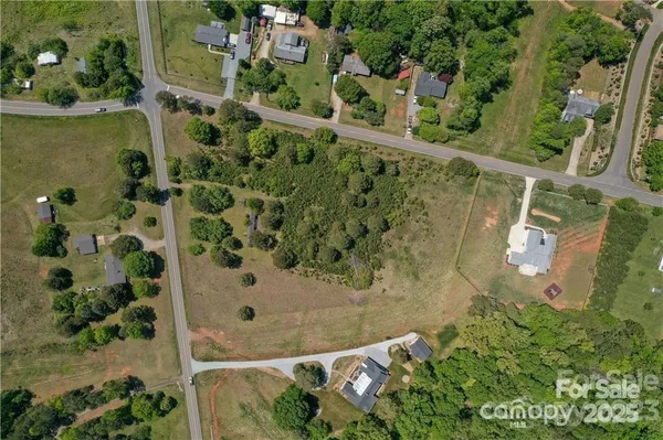 an aerial view of residential house with outdoor space