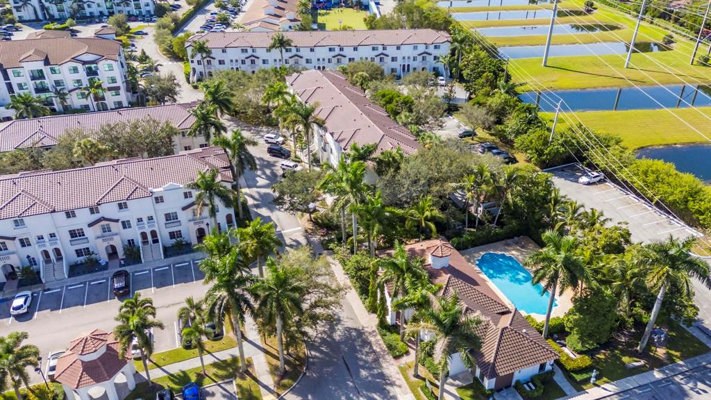5030 Southwest 126th Avenue, Unit 203 Miramar, FL 33027 - Photo 33 of 41 an aerial view of residential houses with outdoor space