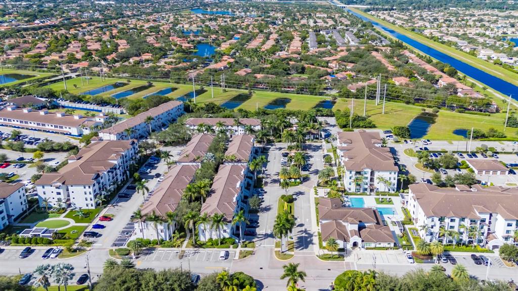 5030 Southwest 126th Avenue, Unit 203 Miramar, FL 33027 - Photo 40 of 41 an aerial view of residential building and car parked