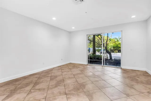 a view of an empty room with window