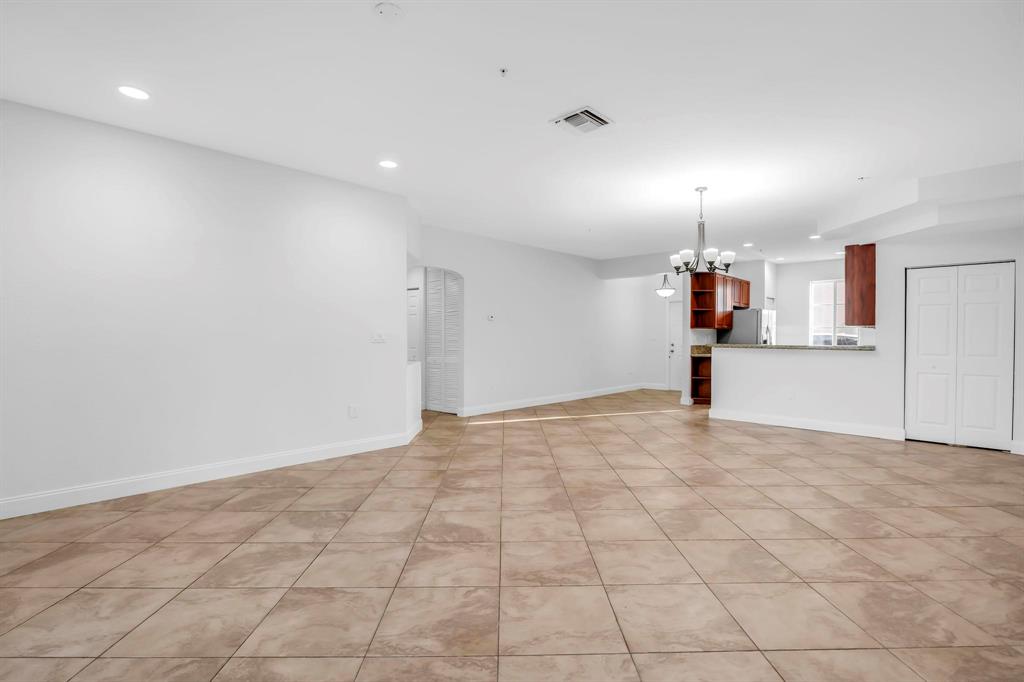 5030 Southwest 126th Avenue, Unit 203 Miramar, FL 33027 - Photo 10 of 41 a view of empty room with wooden floor