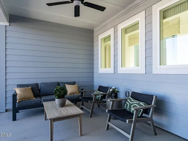 a building outdoor space with patio furniture