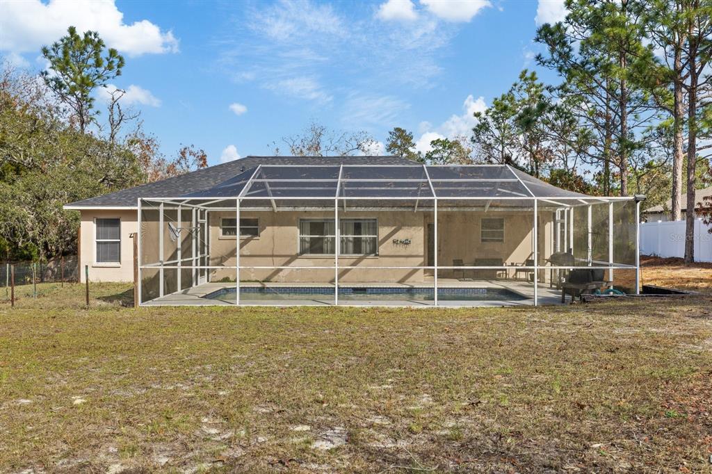 12575 Maleo Road Weeki Wachee, FL 34614 - Photo 21 of 28 Back Yard