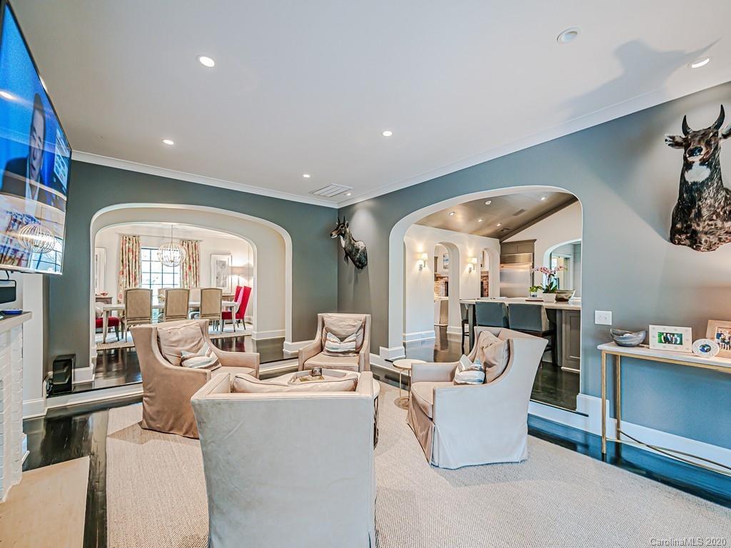 3429 Sharon Road Charlotte, NC 28211 - Photo 12 of 48 a living room with fireplace furniture and a large window