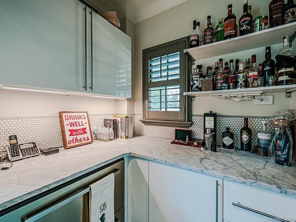 3429 Sharon Road Charlotte, NC 28211 - Photo 20 of 48 a kitchen with a sink and a window