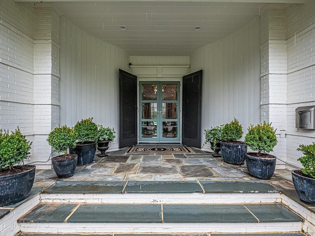3429 Sharon Road Charlotte, NC 28211 - Photo 3 of 48 a view of a potted plants in front of a house