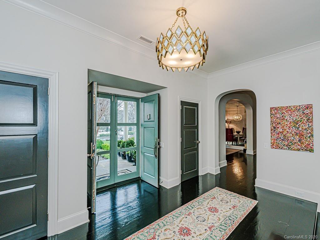 3429 Sharon Road Charlotte, NC 28211 - Photo 4 of 48 a view of a hallway to a livingroom with furniture