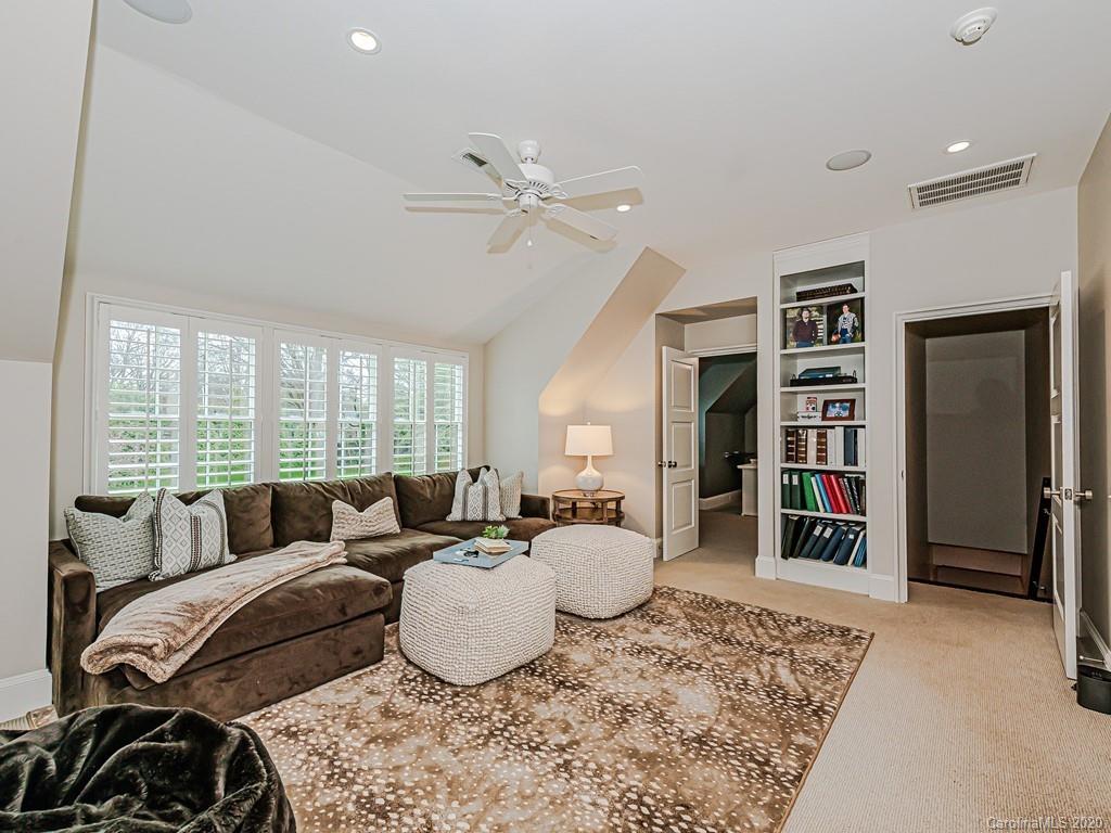 3429 Sharon Road Charlotte, NC 28211 - Photo 36 of 48 a living room with furniture and a window