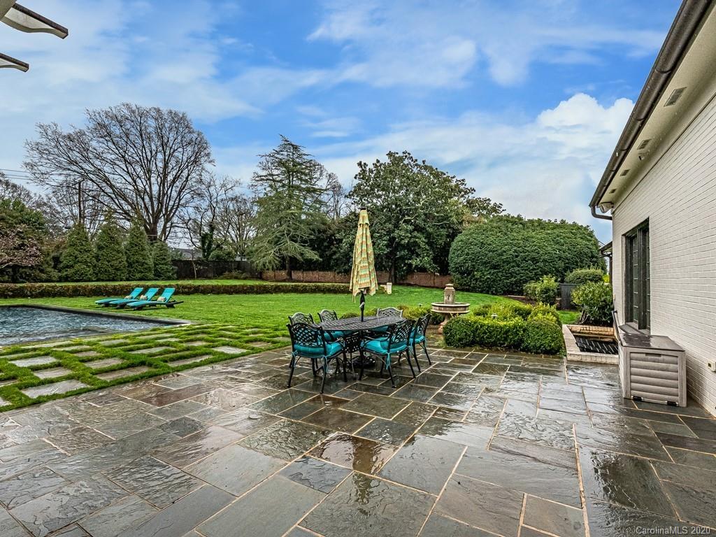 3429 Sharon Road Charlotte, NC 28211 - Photo 45 of 48 a view of a table and chairs in the garden