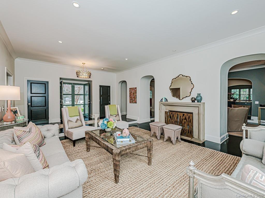 3429 Sharon Road Charlotte, NC 28211 - Photo 7 of 48 a living room with furniture and a fireplace