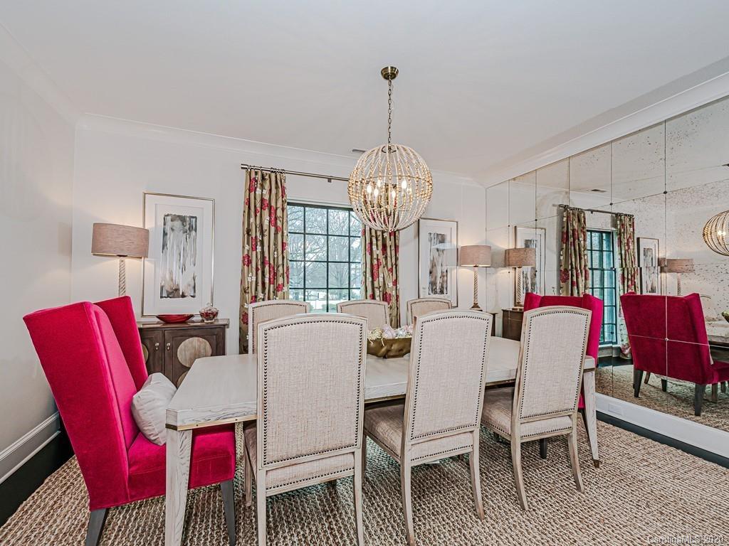 3429 Sharon Road Charlotte, NC 28211 - Photo 9 of 48 a dining room with furniture a chandelier and window