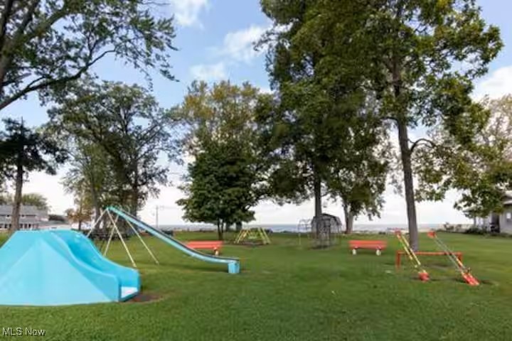 220 Overlook Road Huron, OH 44839 - Photo 6 of 6 Community jungle gym featuring a yard
