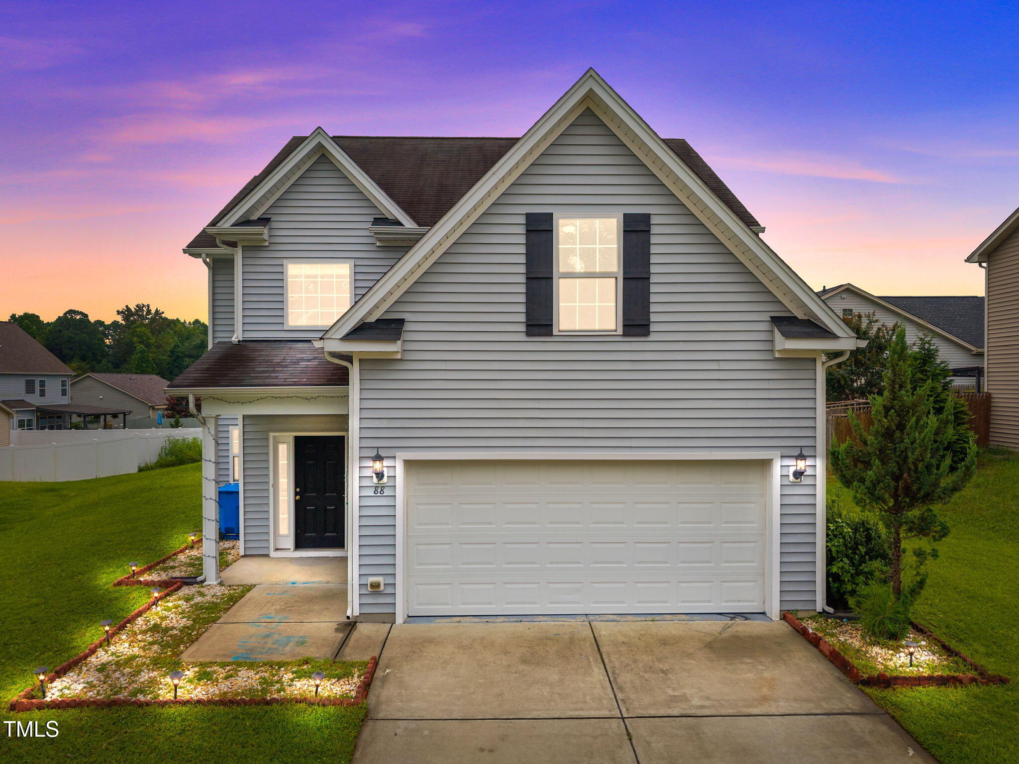 88 Arbor Loop Angier, NC 27501 - Photo 1 of 36 a front view of a house with a yard