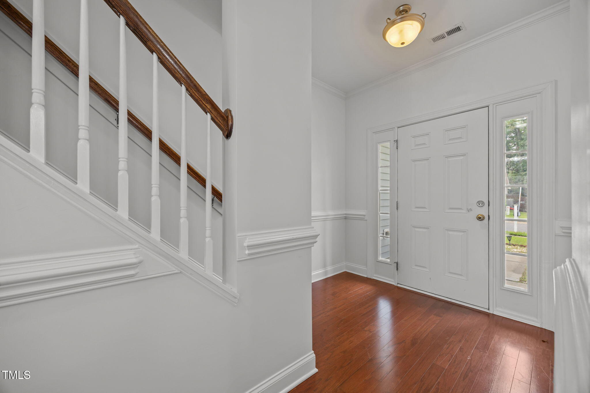 88 Arbor Loop Angier, NC 27501 - Photo 12 of 36 a view of an entryway with wooden floor