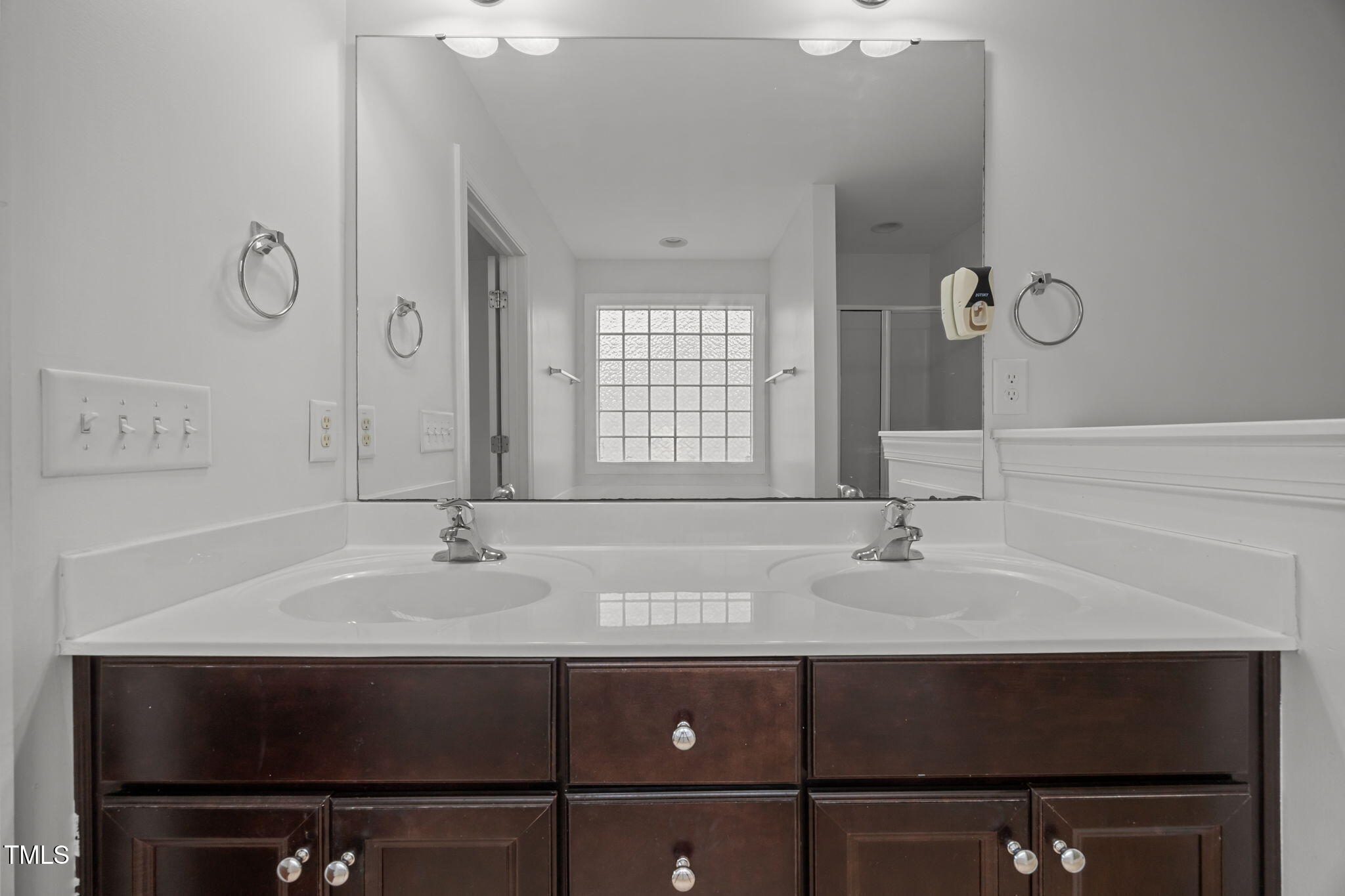 88 Arbor Loop Angier, NC 27501 - Photo 17 of 36 a bathroom with a sink vanity and a mirror