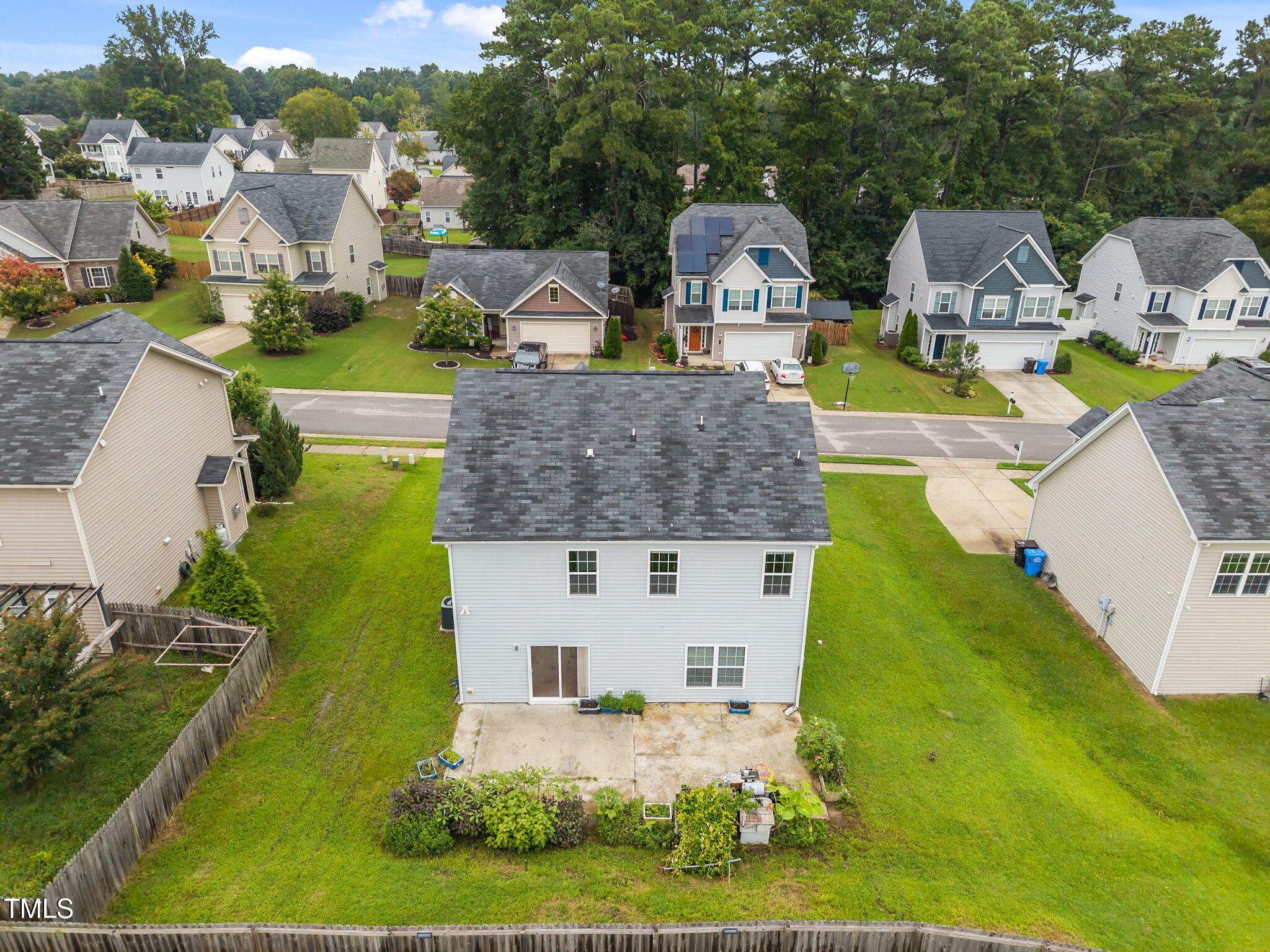 88 Arbor Loop Angier, NC 27501 - Photo 31 of 36 a aerial view of a house with swimming pool garden and patio