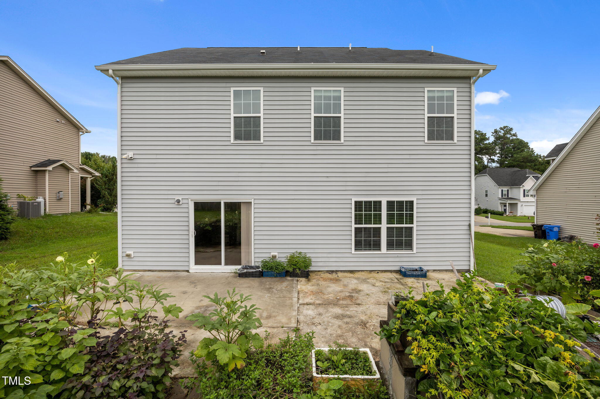 88 Arbor Loop Angier, NC 27501 - Photo 35 of 36 a view of a house with a yard