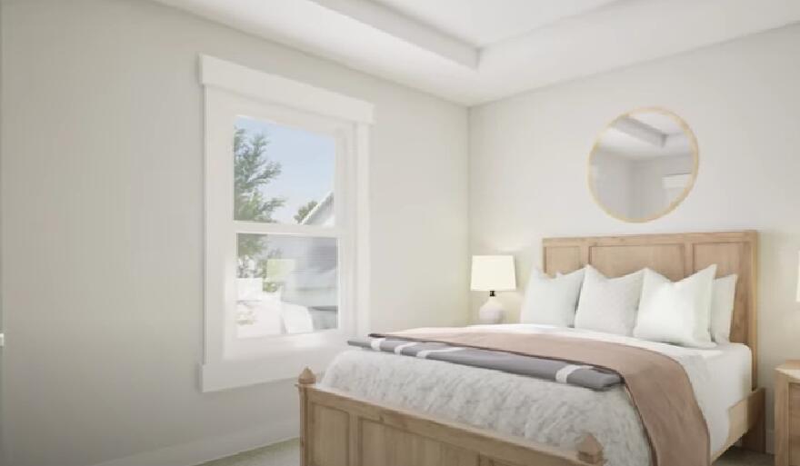 196 Huckleberry Street Freeport, FL 32439 - Photo 6 of 20 a bedroom with a bed and a window