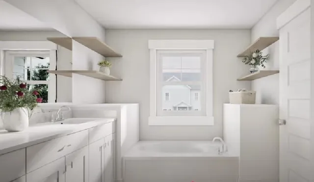 a bathroom with a bathtub sink and mirror