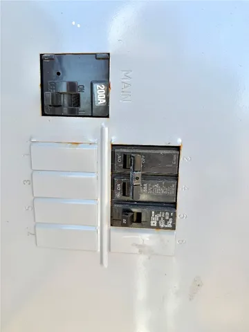 a view of an oven and a refrigerator