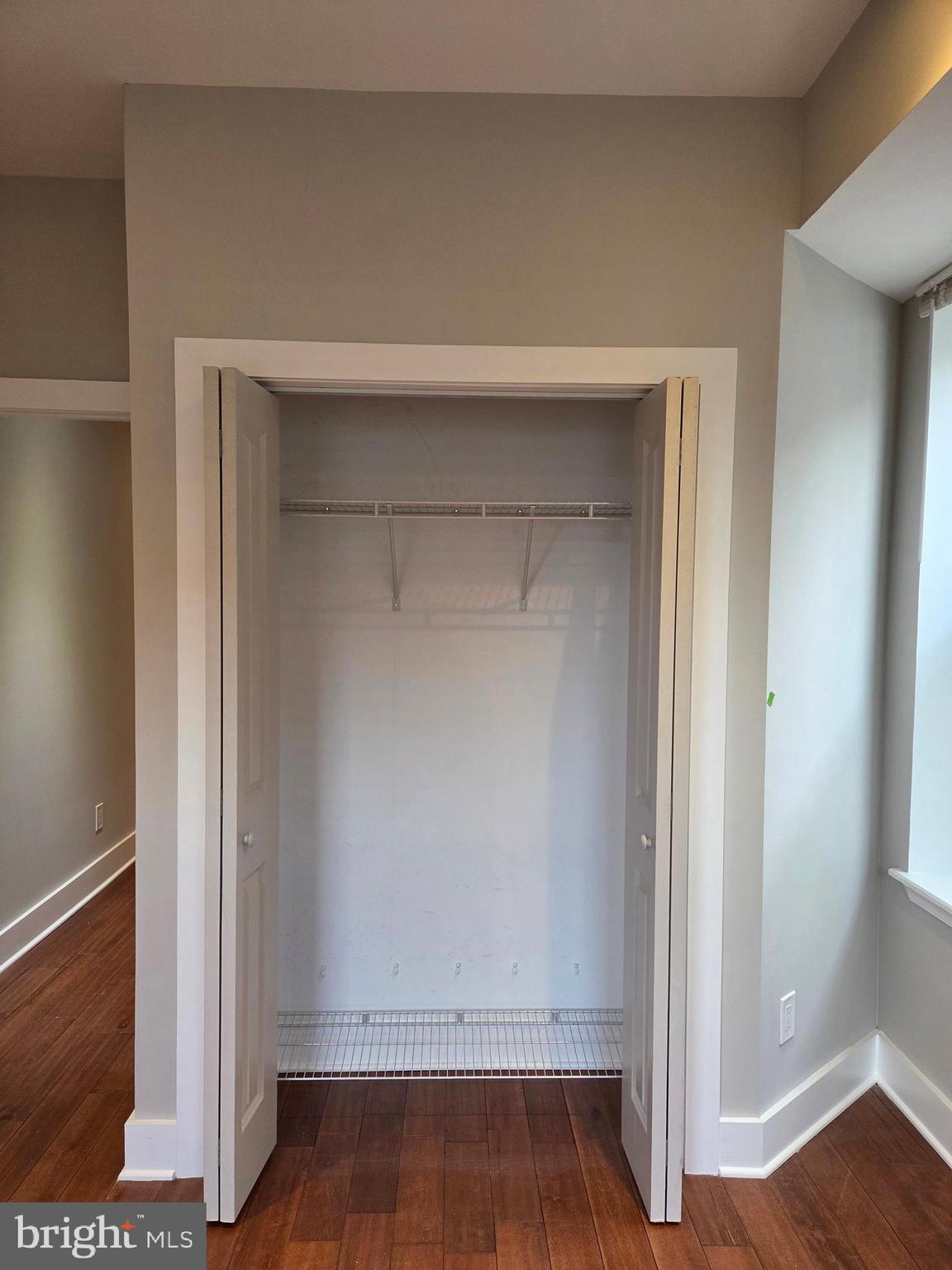 1603 Ellsworth Street, Unit B Philadelphia, PA 19146 - Photo 15 of 43 a view of an empty room with wooden floor