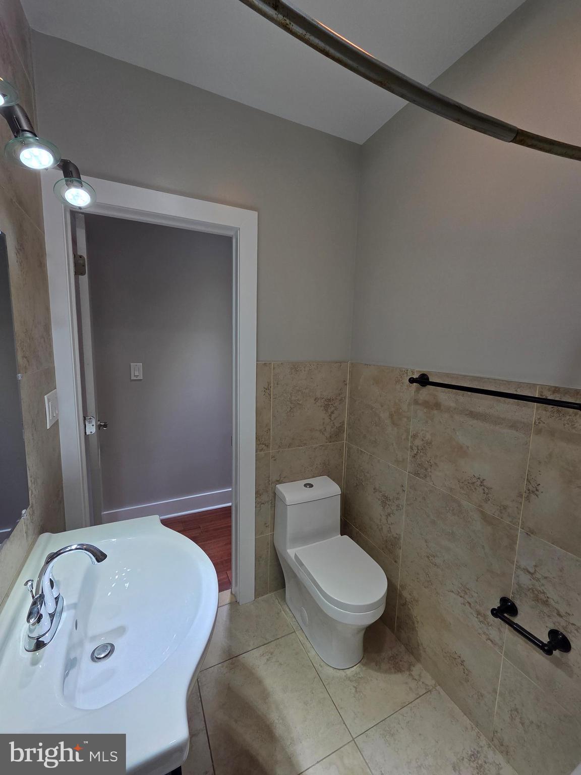 1603 Ellsworth Street, Unit B Philadelphia, PA 19146 - Photo 18 of 43 a bathroom with a toilet and a shower