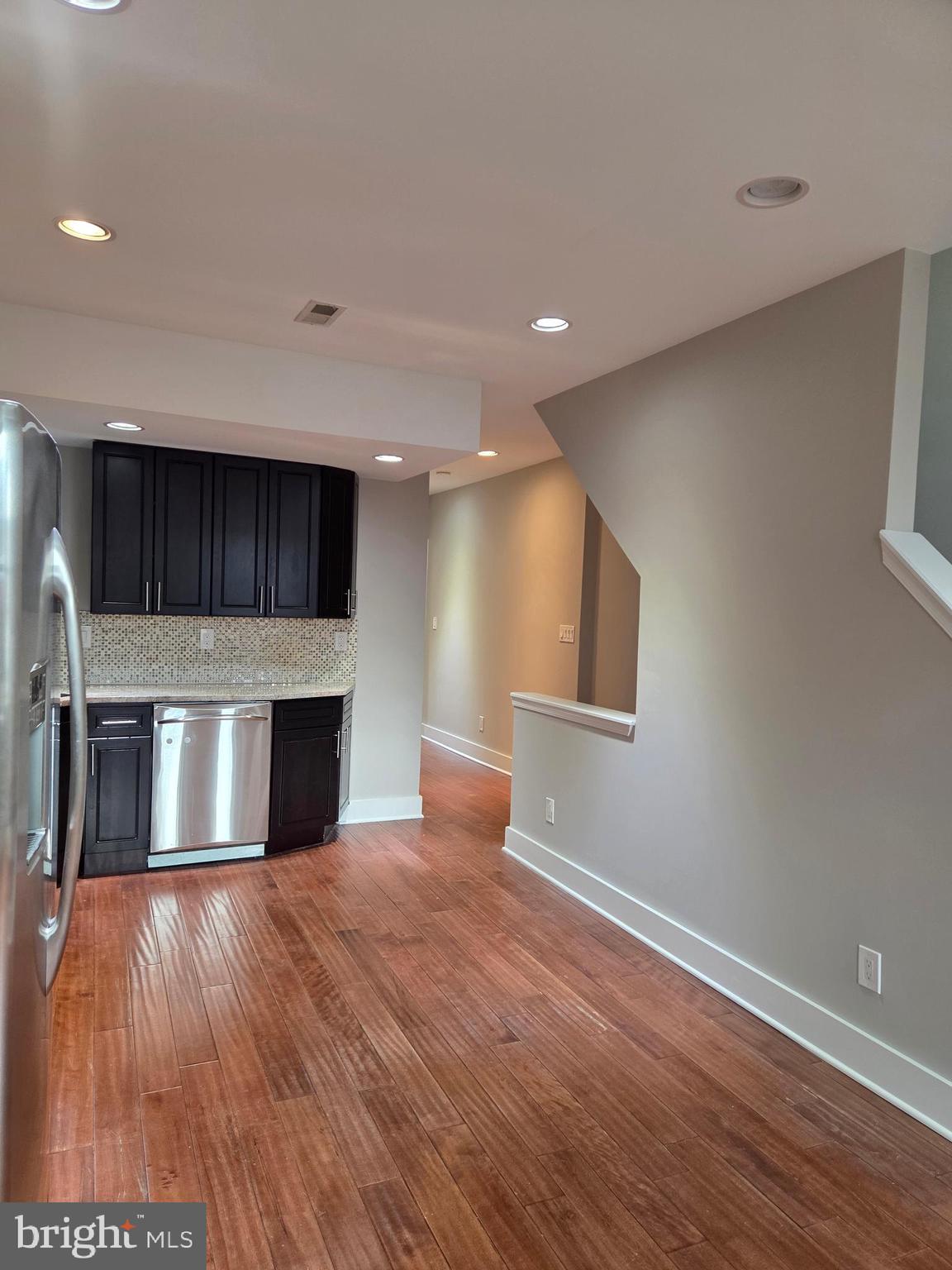 1603 Ellsworth Street, Unit B Philadelphia, PA 19146 - Photo 9 of 43 a view of empty room with wooden floor