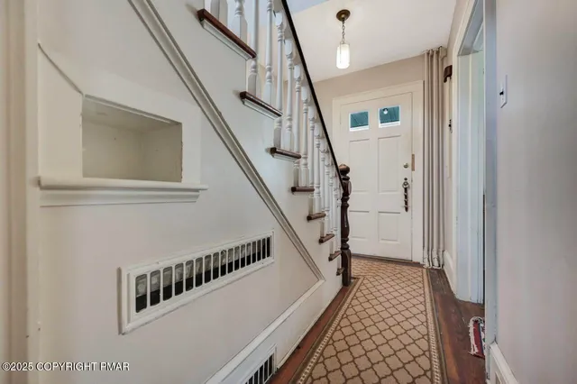 a kitchen with sink refrigerator and stove