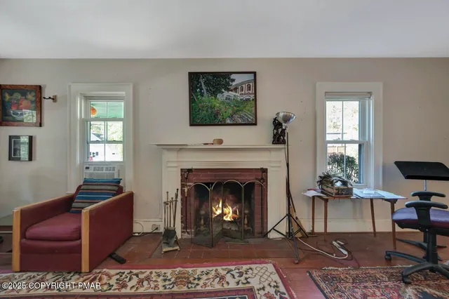 a bedroom with a bed and a view of bedroom