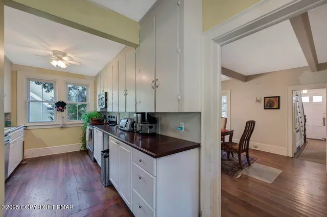 a view of a backyard of the house