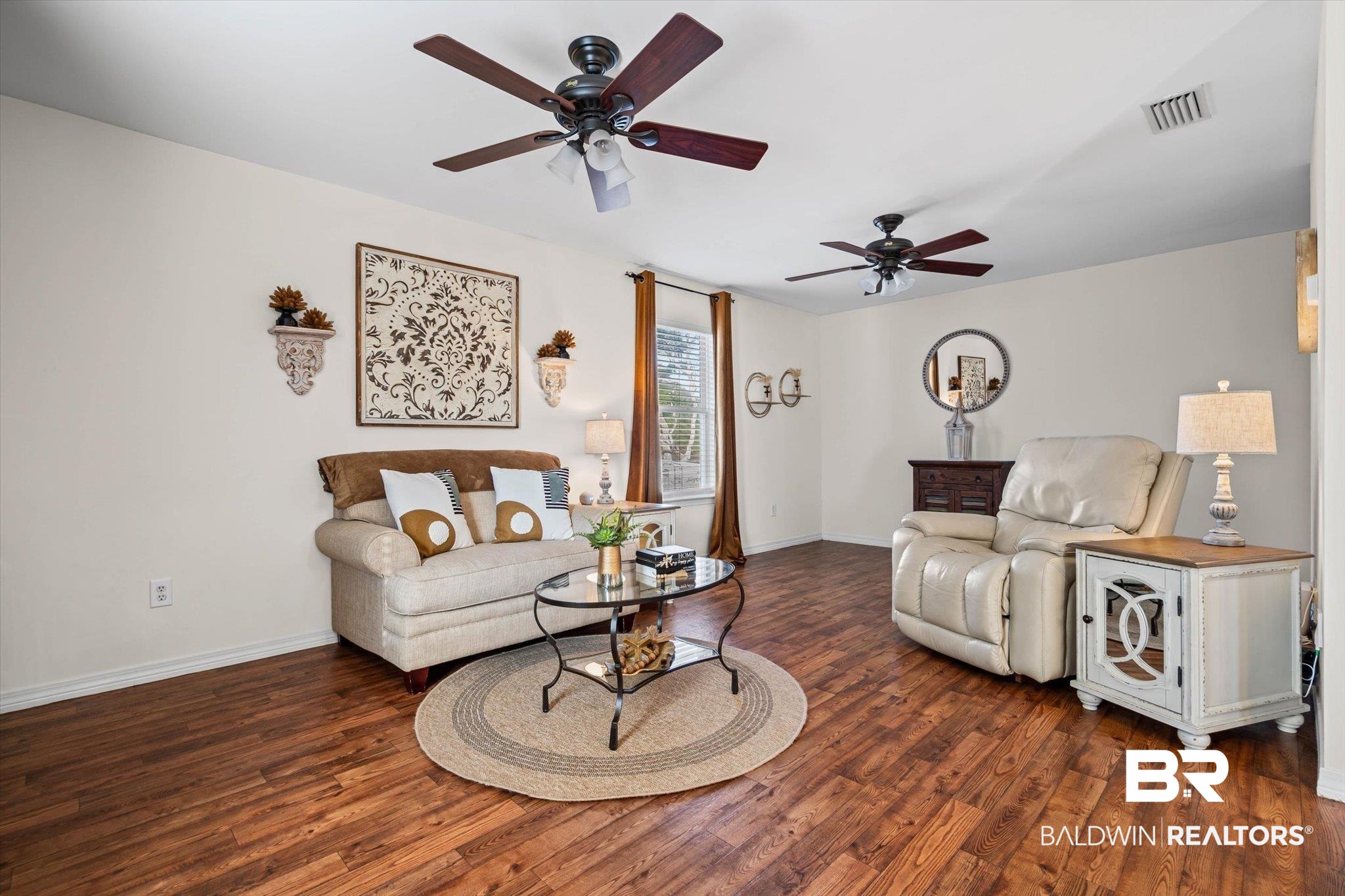 4567 Pine Avenue Saraland, AL 36571 - Photo 27 of 48 Living area featuring ceiling fan and dark wood finished floors