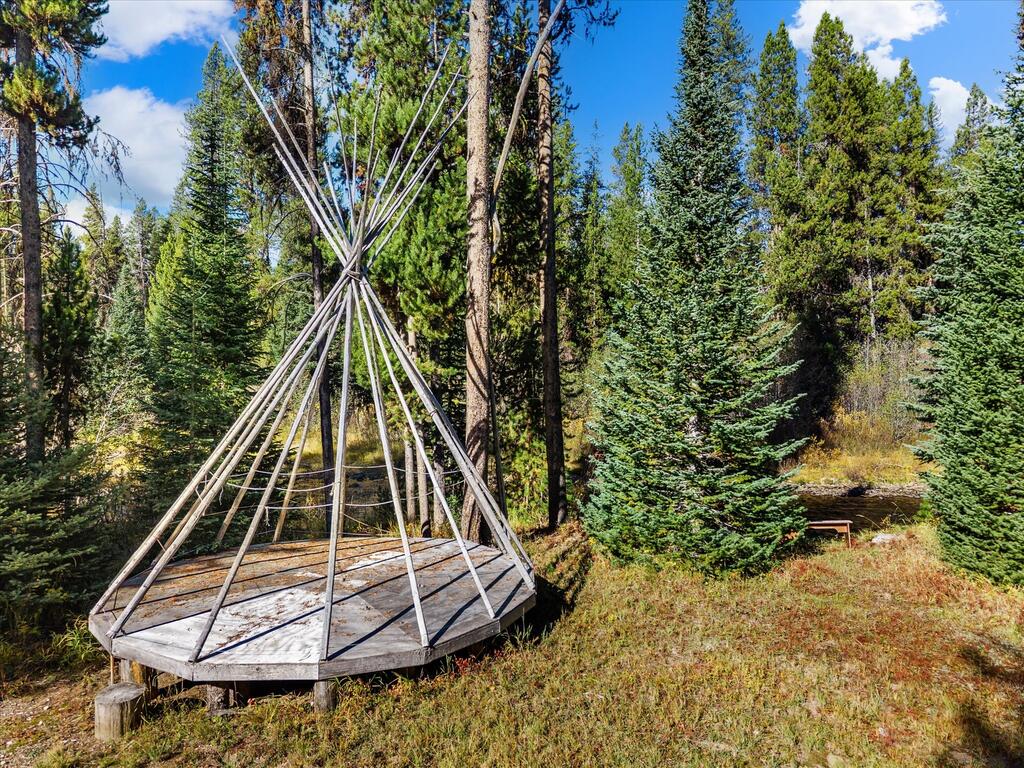 507 Secesh River Road McCall, ID 83638 - Photo 12 of 34 Teepee frame on a raised wood platform, ready for canvas or summer camping.