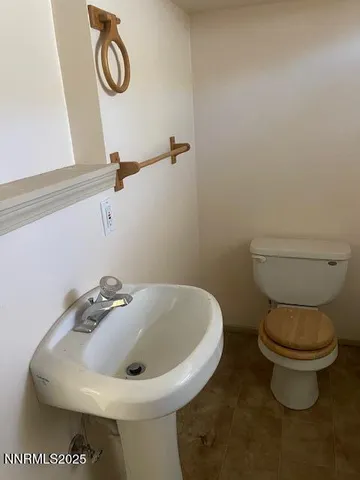 a bathroom with a sink and a toilet