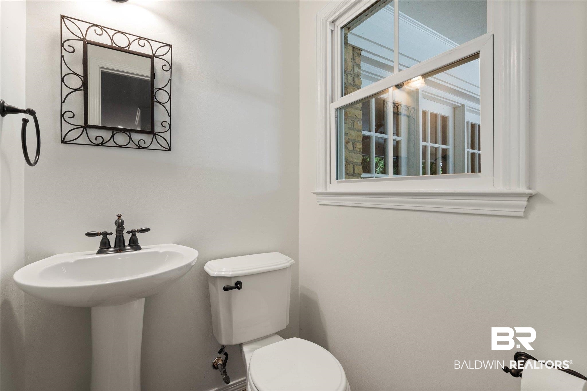 555 East Cumberland Road Mobile, AL 36608 - Photo 15 of 21 Half bath with a sink and toilet