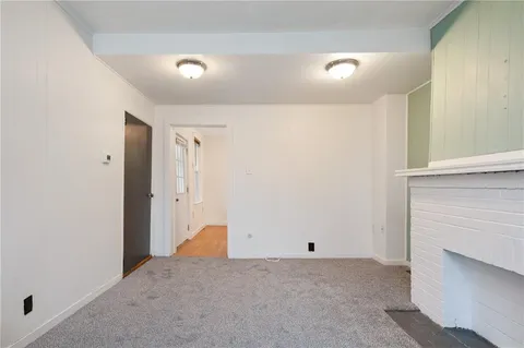 a view of a livingroom with an empty space