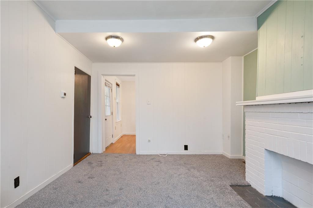 701 Maple Way Oakmont, PA 15139 - Photo 10 of 26 a view of a livingroom with an empty space