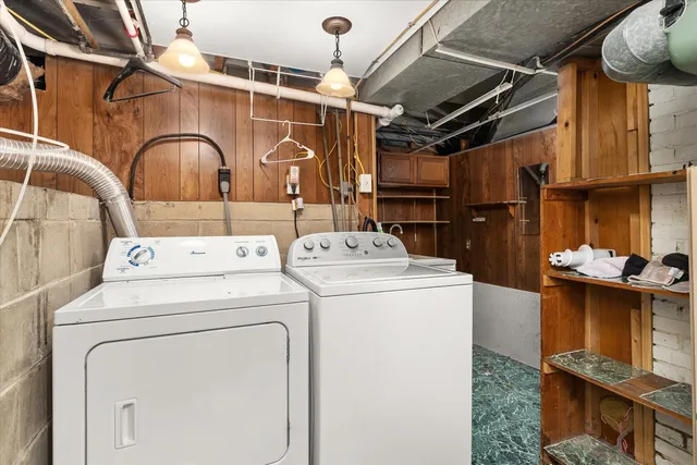 a storage room with washer and dryer