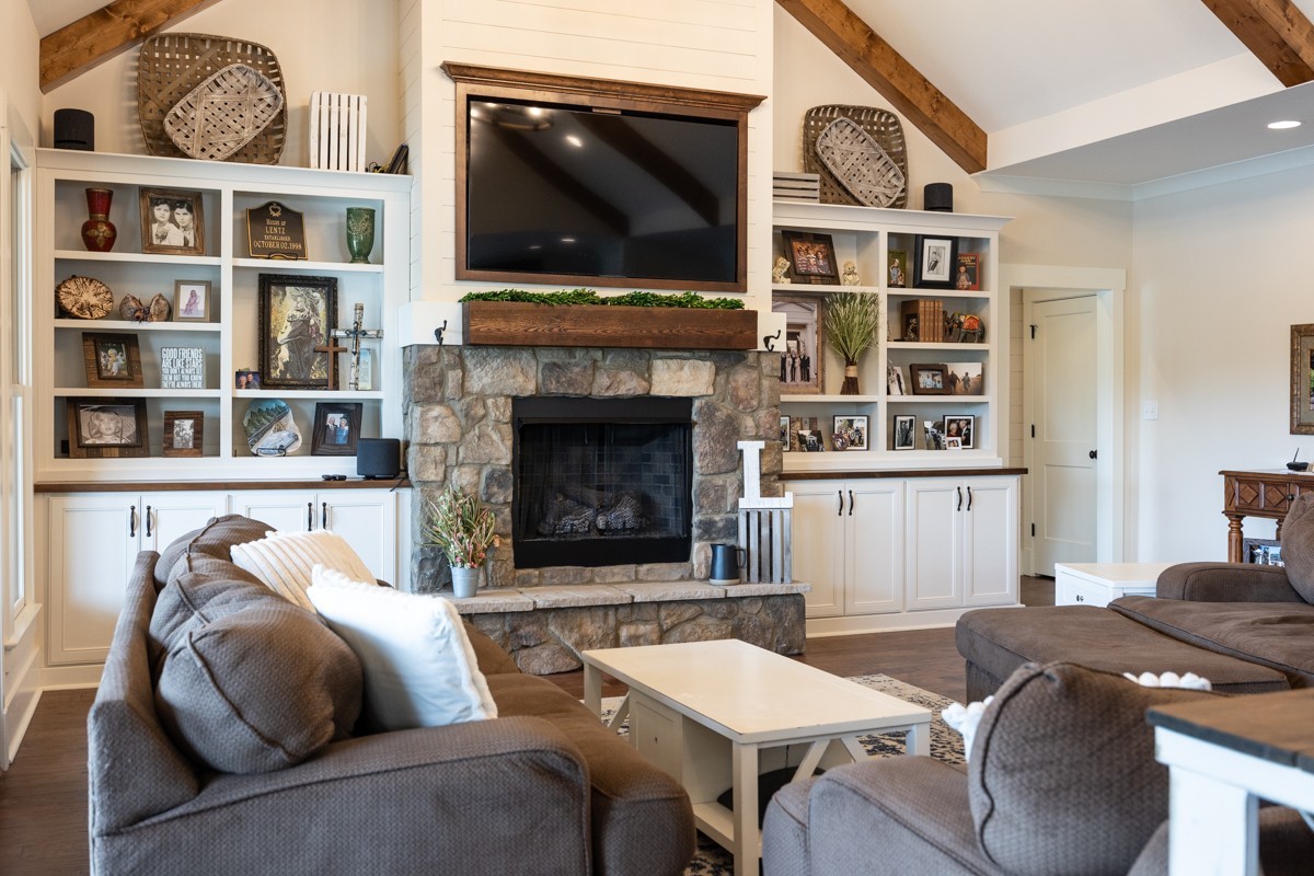793 Davis Road Rogersville, AL 35652 - Photo 12 of 48 a living room with furniture fireplace and flat screen tv