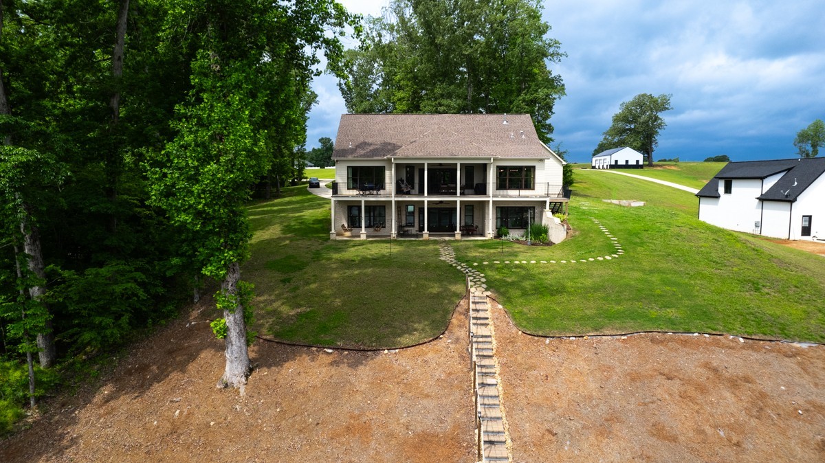 793 Davis Road Rogersville, AL 35652 - Photo 36 of 48 a view of a house with a yard