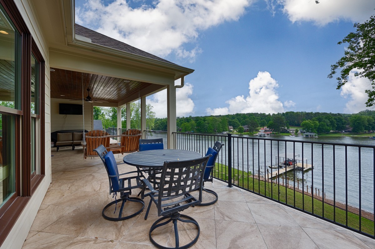 793 Davis Road Rogersville, AL 35652 - Photo 39 of 48 a view of a patio with a table and chairs