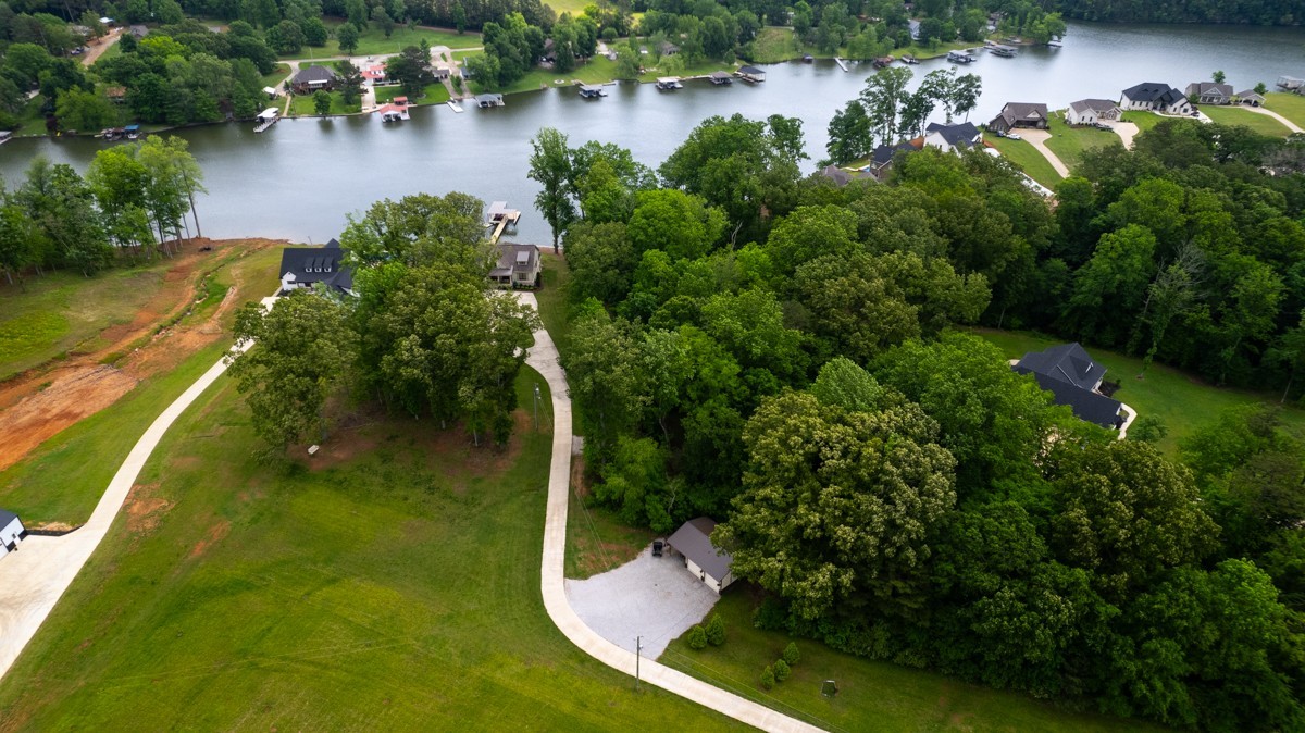 793 Davis Road Rogersville, AL 35652 - Photo 45 of 48 an aerial view of residential houses with outdoor space and lake view