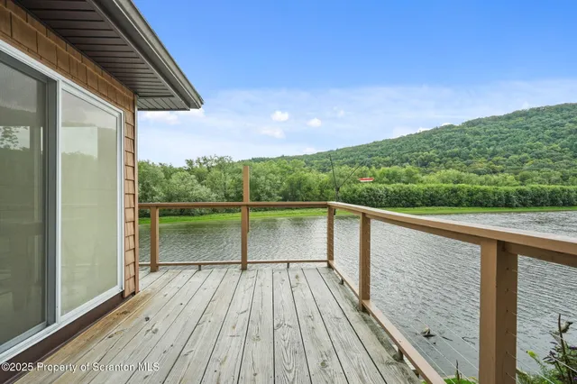 a balcony with view of lake view