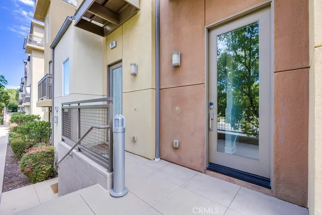 a view of a street with a building in the background